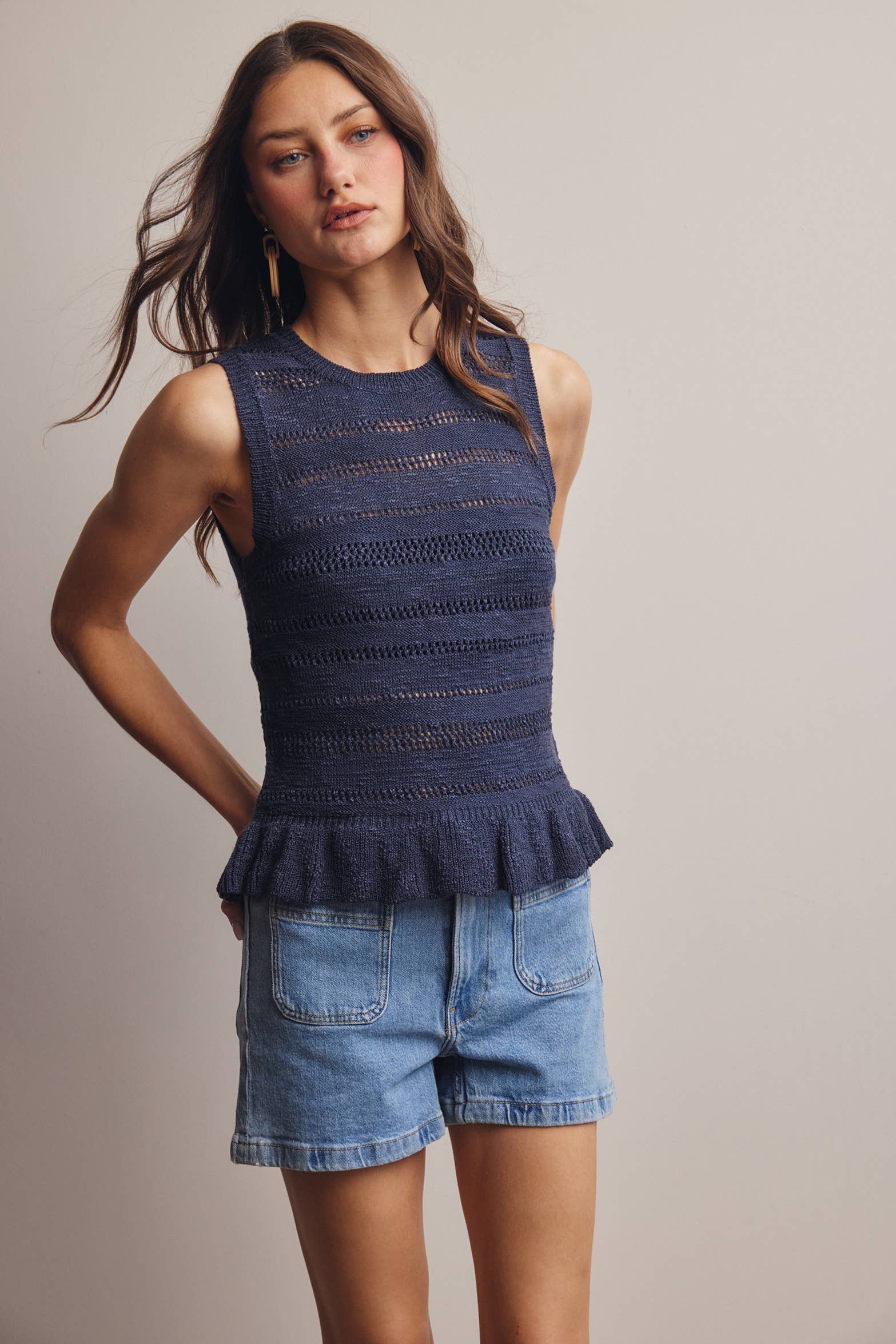 Sleeveless Pointelle Peplum Top