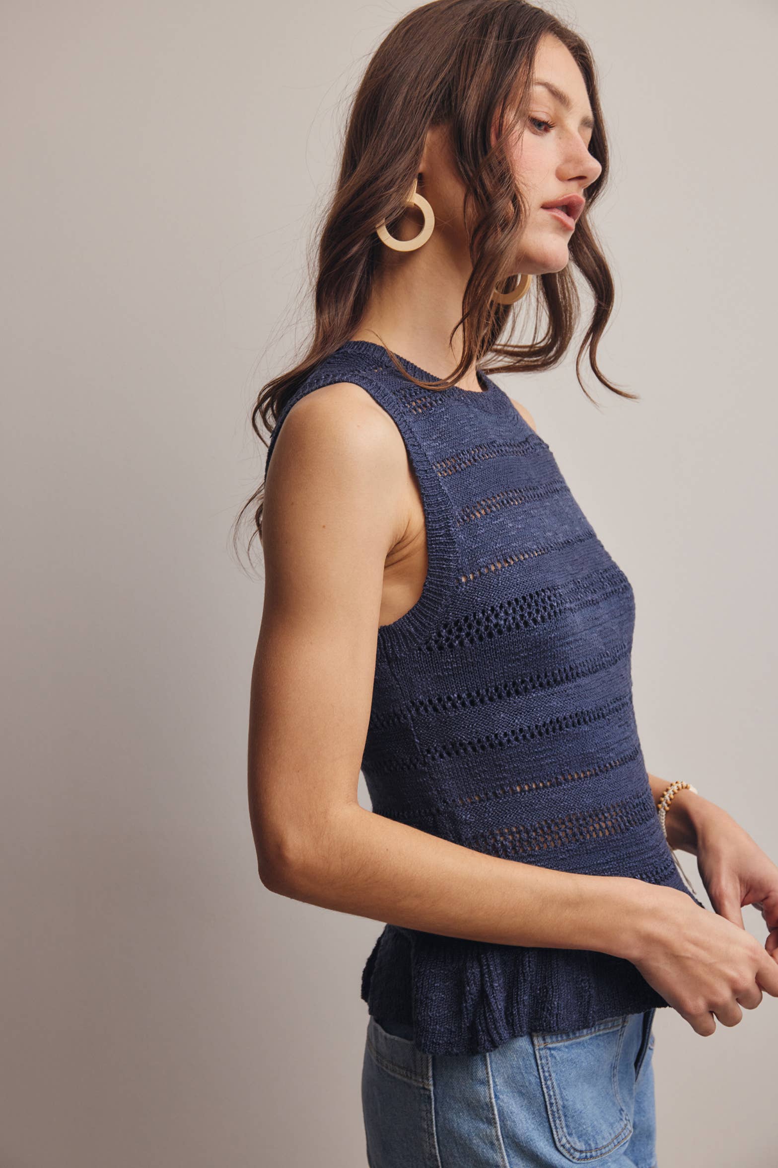 Sleeveless Pointelle Peplum Top