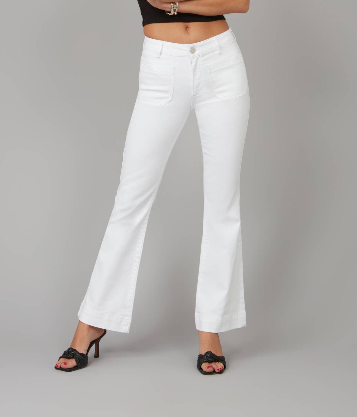 high rise white jeans with flare leg and  front patch pockets