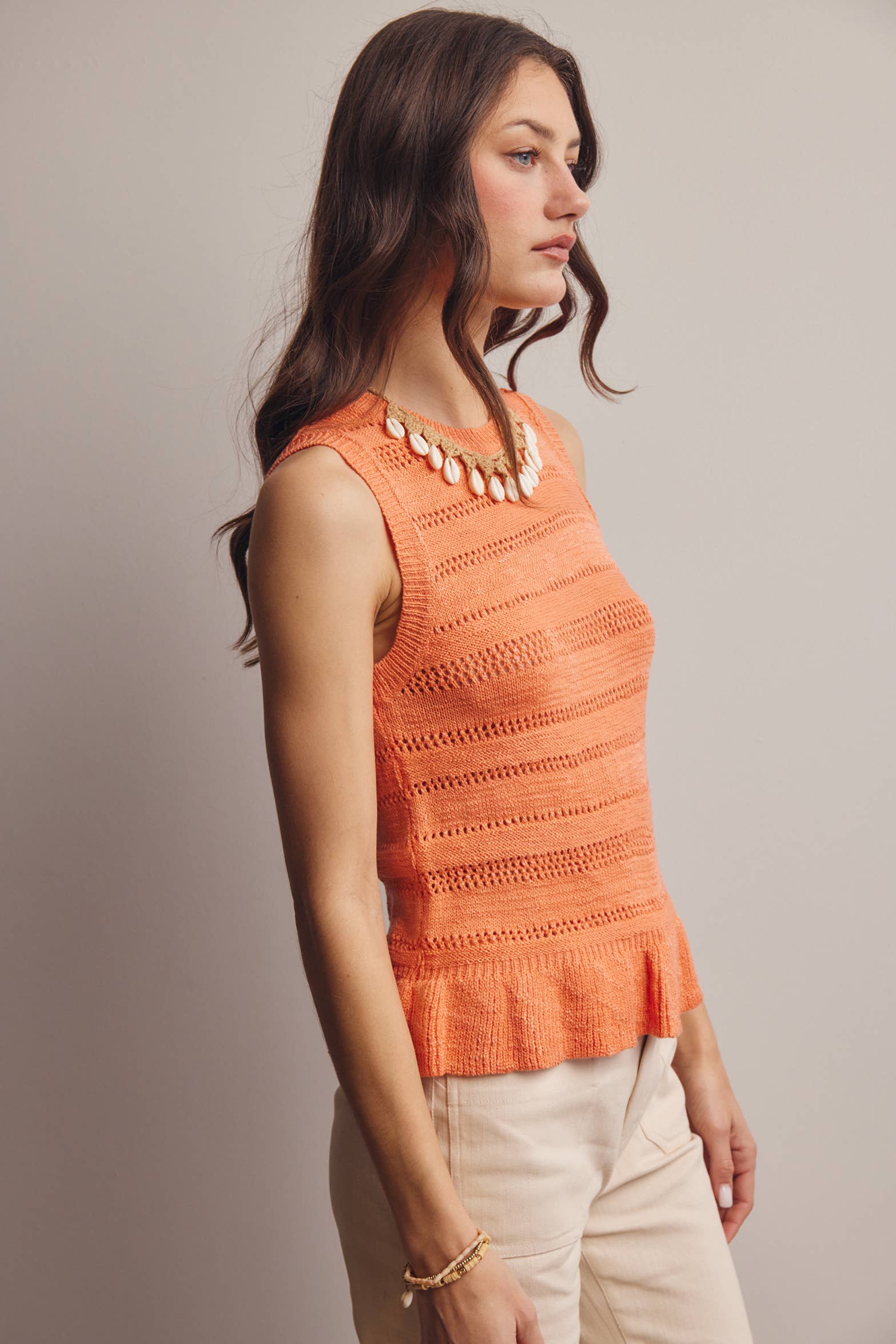 Sleeveless Pointelle Peplum Top