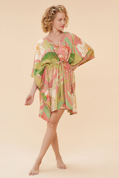 tropical print beach cover up with v-neck. Mid length with a cinched waist.
