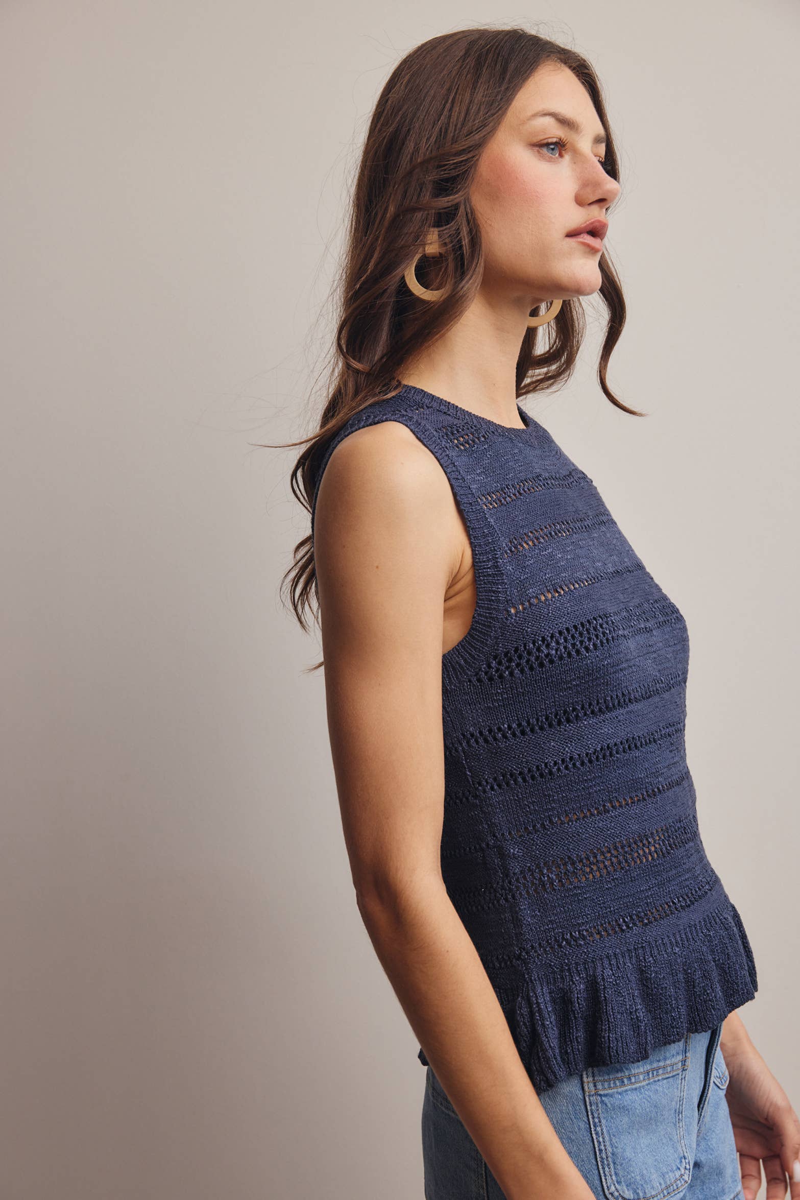 Sleeveless Pointelle Peplum Top