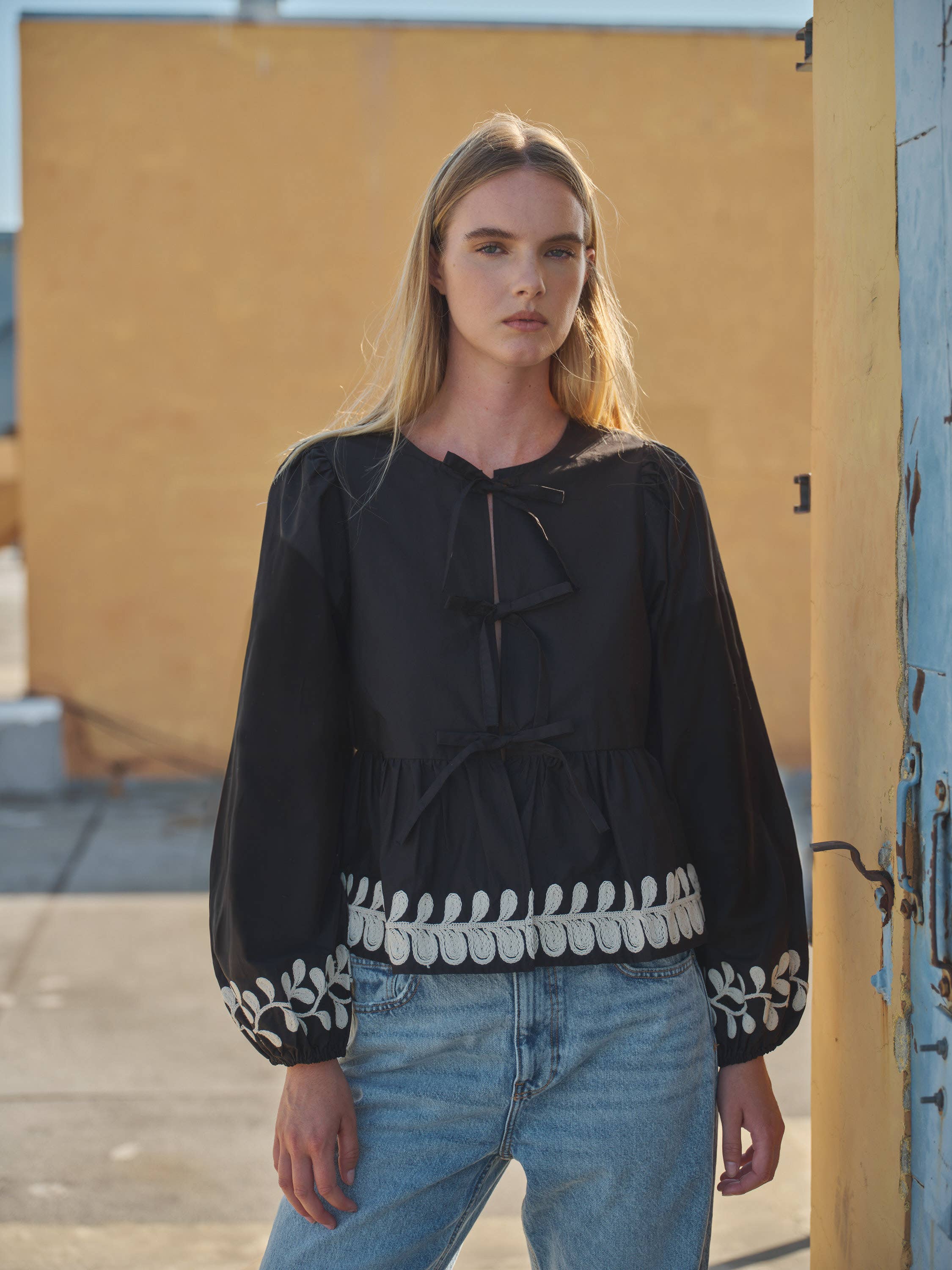 Embroidered Peplum Blouse