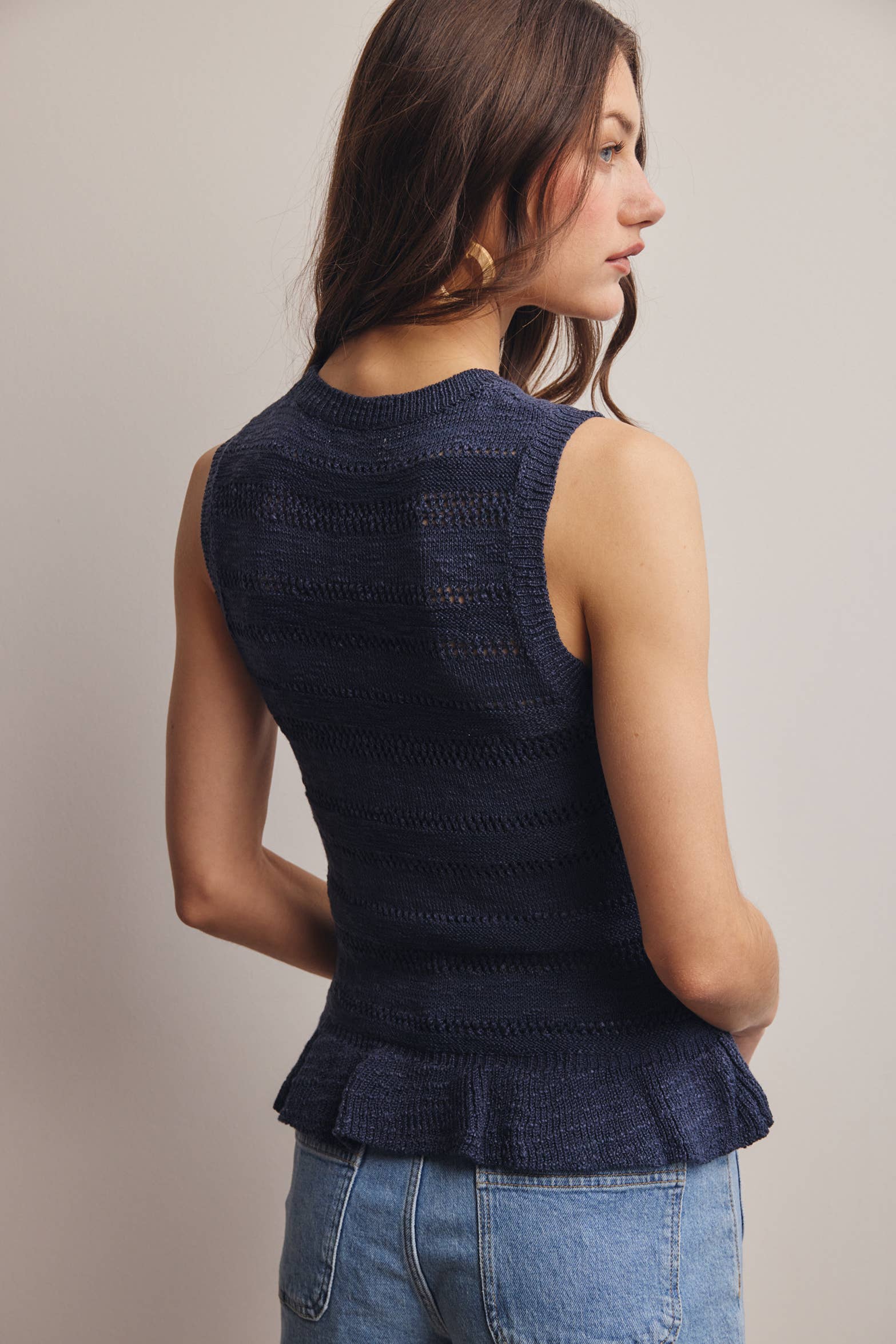 Sleeveless Pointelle Peplum Top